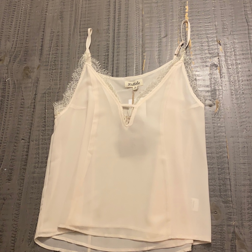 Listicle sheer tank top with deep v. Never worn